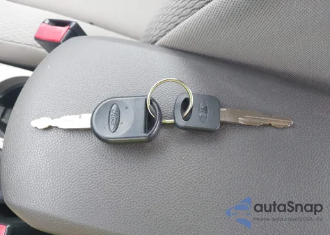 2009 Ford Focus S from USA, damaged, VIN 1FAHP34N09W220485